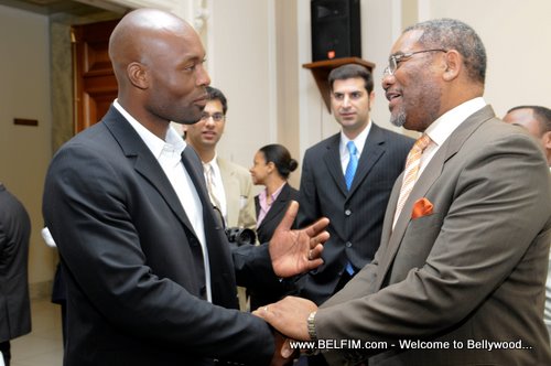 US Rep. Meeks And Jimmy Jean Louis Shaking Hands
